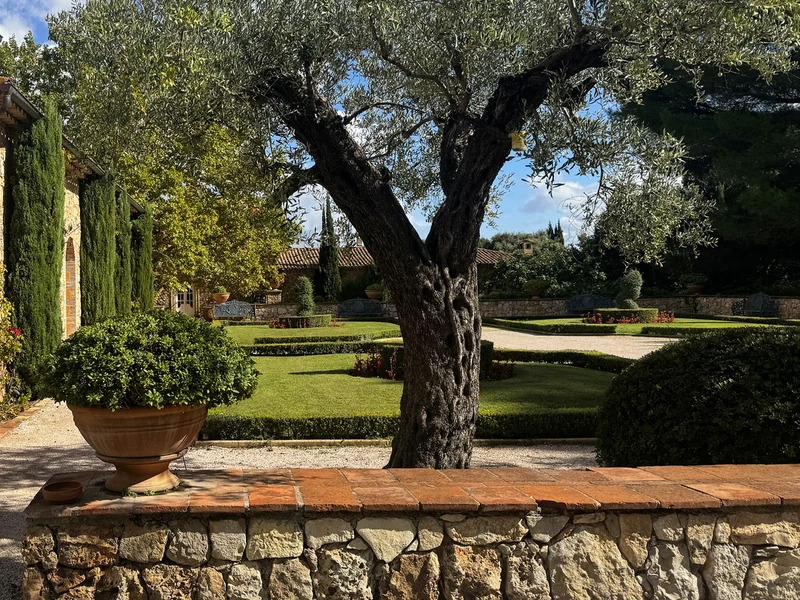 Garden and water feature at Château Font du Broc, photographed on 9 October 2026.